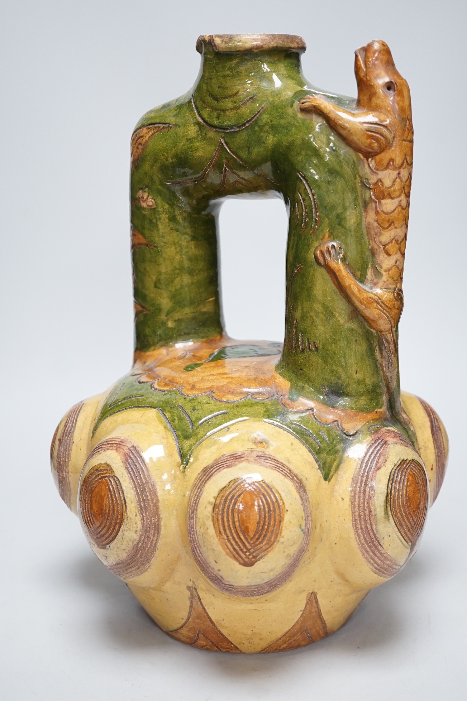 A Continental ‘lizard’ mounted pottery vase, 40cm